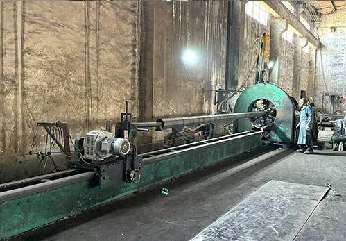 (Automatic Submerged Arc Welding) : Executes deep-penetration longitudinal welds to ensure structural integrity and seamless pole formation.