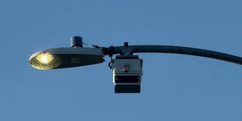 Smart city pole integrating CCTV, Wi-Fi, EV charging and LED street lighting infrastructure
